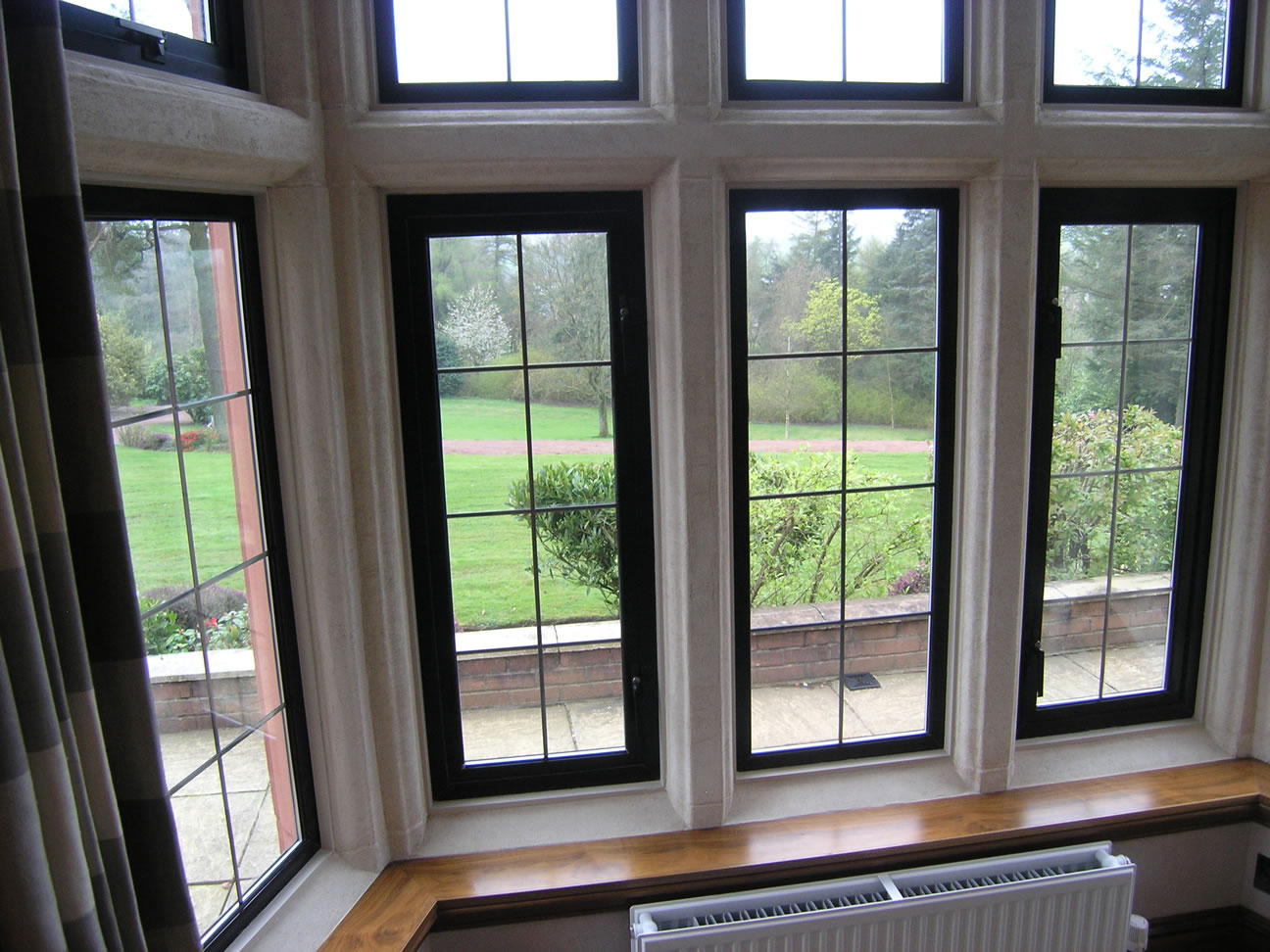 Window mullions restored with pitted Intonachino