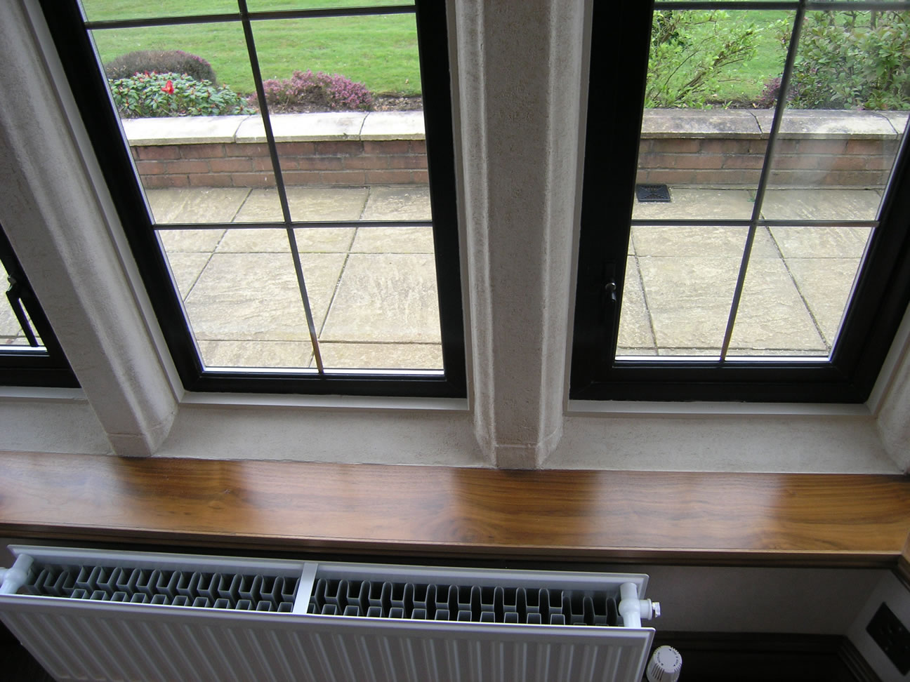 Window mullions restored with pitted Intonachino